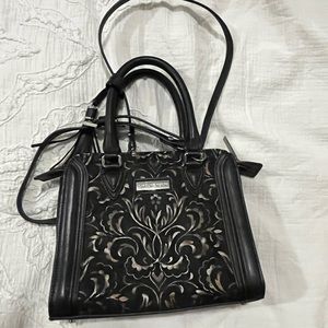 Caroline neron leather bag paisley pattern